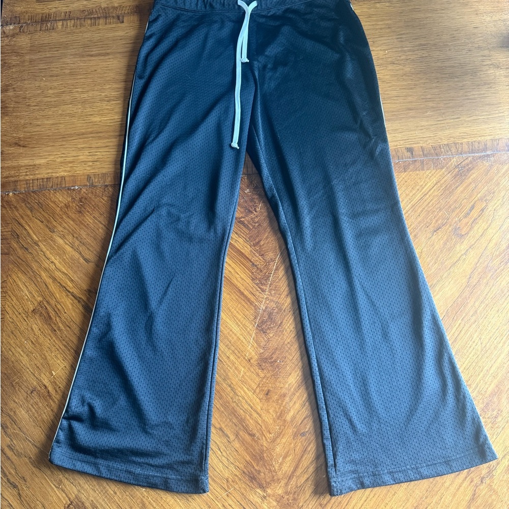 Black Mesh Pants with White Drawstring and white stripes down the sides of legs